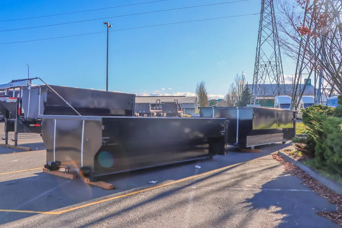 Roll-off dumpster ready for waste disposal at job site for Concrete Dumpster Rental in Dripping Springs